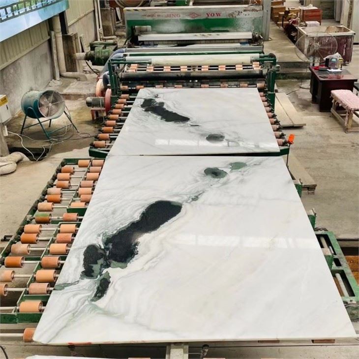 Panda White Naturali Irħam Slab